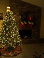 Christmas tree by the fireplace FREE Stock Photo, fireplace, christmas lights, family at home picture