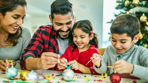 Free Festive Family Decorating stock image to download Festive Family Decorating FREE Stock Photo, family at home, family, happiness picture