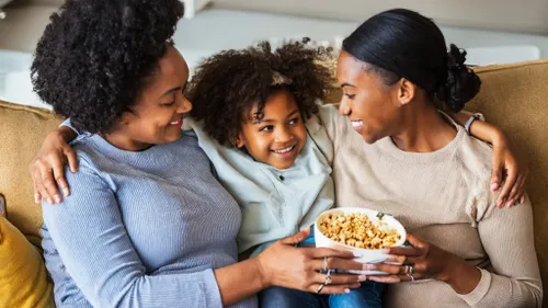 Free Joyful Family Bonding stock image to download Joyful Family Bonding FREE Stock Photo, popcorn, smiles, friendship picture