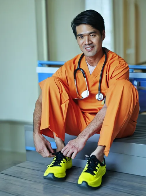 Smiling Doctor Preparing FREE Stock Photo, doctor,  healthcare,  scrubs picture